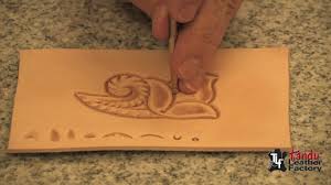 The raised design imprints the leathercraft. How To Carve Leather With Pictures Wikihow