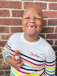 She asked for a toy that looked like her adopted son — and never expected  this response