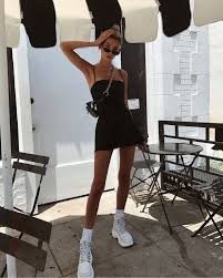 Hailey Rhode Bieber Formally Hailey Baldwin In A Black Mini Dress With Balenciaga Sling Bag And Chunky White Sneak Trendy Outfits Fashion Inspo Outfits Fashion