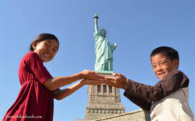 People posing next to the statue of liberty as it's unpacked, 1886 1280x1765. Visiting The Statue Of Liberty With Kids The World Is A Book