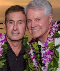 Couple, inspired by father's Roy Moore protest after daughter's suicide,  fund scholarship