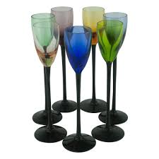 Colorful vintage mixed cordials delicate rainbow set of 5 mcm cordial cocktail glasses retro colored yellow purple blue green tall tasters Mid Century Vintage Long Black Stem Multi Color Cordial Glasses Available At The Hour Thehourshop Com Vintage Glassware Cordial Glasses Cocktail Glassware