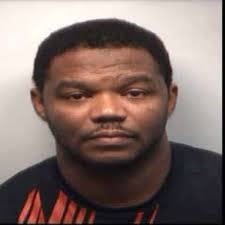 Two Suspects Arrested for Body Found in Burning Car