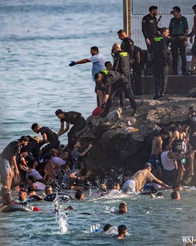 Spain rushed to tighten border security after tens of thousands of  immigrants from Morocco illegally entered a tiny Spanish territory in North  Africa, overwhelming local authorities and sparking what could be Europe's