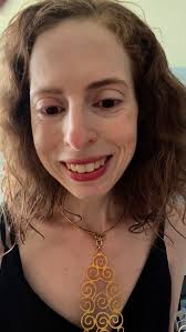 Iris Glass. Iris glass is a term used for a piece of clear glass that has a  mix of pink, blue and green. This is STUNNING IRIS GLASS necklace that has 5