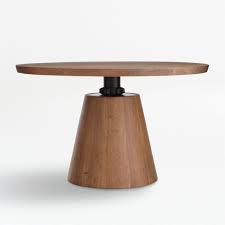 A classy coffee table and 4 nesting stools of wood in browns. Revolve 48 Round Adjustable Height Dining Table Reviews Crate And Barrel