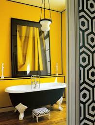 Look At Those Legs Black Vintage Bathtub Black And White Print Wallpaper And Stool Exaggerat Yellow Bathroom Decor Yellow Bathroom Walls Yellow Bathrooms