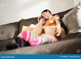 Lesbian Couple with Colorful Socks Embracing on Sofa at Home Stock Image -  Image of intimacy, love: 139958041