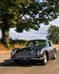 Image result for Pacific Blue 1963 Aston Martin