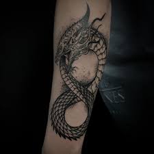 101 Ouroboros Tattoo Designs You Need To See Ouroboros Tattoo Jormungandr Tattoo Arm Band Tattoo