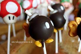 Today we made super mario mushroom cake pops! Dabobomb Mario Cake Super Mario Cake Super Mario Birthday Party