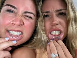 Woman and bridesmaids reveal secret lip tattoos at wedding