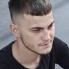 The shag usually has bangs, waves or curls, sideburns, and long hair at the neck. 1
