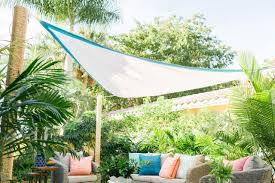 A slice of shade creating canopies. Beat The Heat And Add Privacy With An Embellished Shade Sail Hgtv