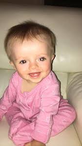 Baby girl diagnosed with deadly eye cancer after her gran spots strange  white glow in this photo