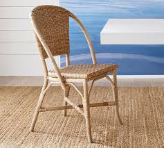 Parisian Woven Dining Chair Pottery Barn In 2020 Dining Chairs Wicker Dining Chairs Outdoor Dining Chairs