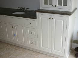 Consider replacing your bathroom vanity altogether and use a kitchen cabinet instead. Custom Bathroom Vanities And Bathroom Cabinets