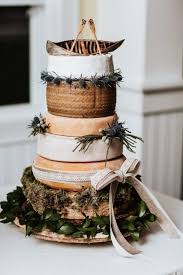 Cheese Wheel Rustic Wedding Cake With Canoe And Paddle Topper Cheese Wedding Cake Bohemian Wedding Cake Wedding Cake Rustic