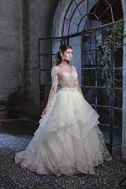 Check out our plus size ballgown selection for the very best in unique or custom, handmade pieces from our women's clothing shops. Casablanca C125 Long Sleeve Sheer Bodice Ballgown With Extensive Beading And A Silk Handkerchief Skirt Bri Zan Couture