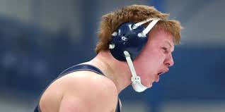 Xavier's Mac and Anna Strand share strong bond through wrestling, athletics