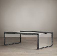 Its tempered glass top sits atop four sleek rounded legs, which in turn sit atop white manufactured wood legs, with a tempered glass lower shelf perfect for hosting extra magazines or. Waterfall Glass Iron Coffee Table