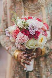 Traditional Indian Wedding With Modern Elements Belle The Magazine Indian Wedding Flowers Colorful Bridal Bouquet Flower Bouquet Wedding