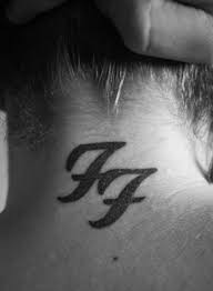 The vanishing tattoo | the webs' biggest list of celebrities with tattoos, tattooed historical figures, supermodels, sports and rock stars all with tattoos, lots of pictures! Foo Fighters Logo Pairodicetattoos Com Foo Fighters Tattoo Foo Fighters Logo Neck Tattoo