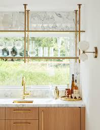 Collector S Shelving Unit In Window In 2020 Glass Shelves Diy Hanging Shelves Kitchen Window Shelves
