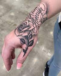 Rose tattoos are popular among both men and women. Art Amazing Hand Rose Script Names Tattoo By Awesome