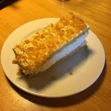 Tompouce is a traditional dutch pastry consisting of a thin puff pastry that is filled with cream and topped with a layer of smooth, pink icing. Bijenkorf Tompouce Typical Dutch Dessert Picture Of De Bijenkorf Kitchen Amsterdam Amsterdam Tripadvisor