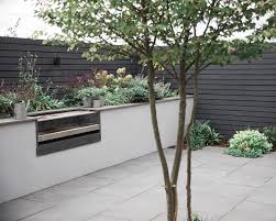 Contemporary Garden With Built In Bbq Back Garden Design Contemporary Garden Built In Garden Seating