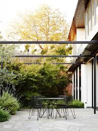 15 For 2015 Best Garden Design Trends For Fall Gardenista Pergola Patio Pergola Iron Pergola