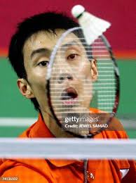 Indonesian badminton player Nova Widianto smashes the shuttlecock as...  News Photo