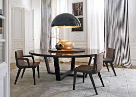 Dining Room Featuring The Xilos Dining Table Round Designed By Antonio Citterio Dining Table Black Marble Top Dining Table Modern Dining Room