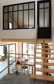 Une Maison Organisee Autour De Son Patio Maison Plan Maison Deco Mezzanine