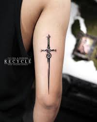 What is the meaning of a sword tattoo? 50 Gorgeous Tattoo Designs You Ll Desperately Desire Tattooblend Gorgeous Tattoos Sword Tattoos For Women Abstract Tattoo Designs
