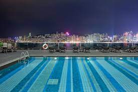 An Outdoor Swimming Pool At Hotel Icon Hong Kong Hotels Hotel Hotels Design