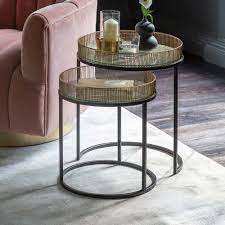 Place lamps, display photos, and incorporate storage by adding a coffee and side tables to a sofa or couch. Doris Nesting Side Tables Atkin And Thyme