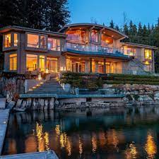 Luxury cabins for your north carolina mountain vacation. Mega Mansions On Instagram Beautiful Waterfront Home Savour The Natural Beauty In Seclusion With Access To P Mansions Waterfront Homes Luxury House Designs