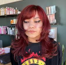 Who can recommend a hair stylist for layering and coloring?