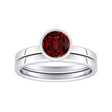 Bright high quality.25 carat diamond in the center flanked by.32 carat of fine rubies with some nice engraved design. Lana Solitaire Ruby Wedding Ring Set In 14k White Gold With 0 50 Carat Round Stone Diamondwish Com