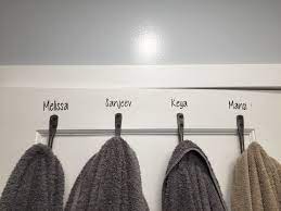 Away To Be Little More Organized In The Bathroom Label The Towel Hooks On The Back Of The Door Indian In The Cupboard Hooks For Towels Bathroom Door Hooks