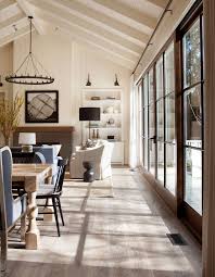 It gives a relaxed feeling to what could otherwise be a more formal and traditional room. A Rustic Chic Family Home Made For Indoor Outdoor Living Farm House Living Room Home Decor House Design