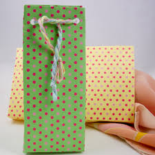 Wrapping paper or newspaper is good material to use if you have something more delicate in mind. How To Make Easy Gift Bags Boxes And Bags Aunt Annie S Crafts