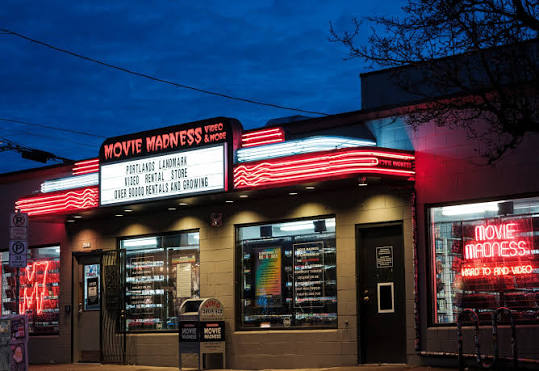 Today's video store spotlight is @moviemadness_pdx in Oregon. Movie Madness  is a Portland institution. Known for its vast collection, knowledgeable  staff, and display cases full of legendary film props, the iconic Belmont