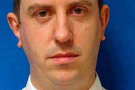 PSNI pipes lead parade at funeral of officer Dave Phillip