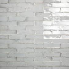 The use of glass subway tiles is an elegant way to incorporate clean lines and dimension to any #kitchen. 3x12 Ceramic Tile Tile The Home Depot