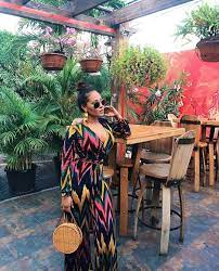 Try to avoid synthetic material, which may not be as breathable as woolens and linens. Get The Look Adrienne Bailon S Jamaica Vacation Fashion Nova Wild World Chevron Jumpsuit Fashion Bomb Daily Style Magazine Celebrity Fashion Fashion News What To Wear Runway Show Reviews
