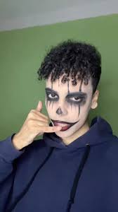 Transforming into a Jack-O-Lantern Makeup Look