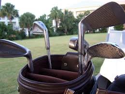 An easy tip to the golfer struggling with their short game is to wedge a second staff or alignment stick onto the grip end of a club. Iron Golf Wikipedia